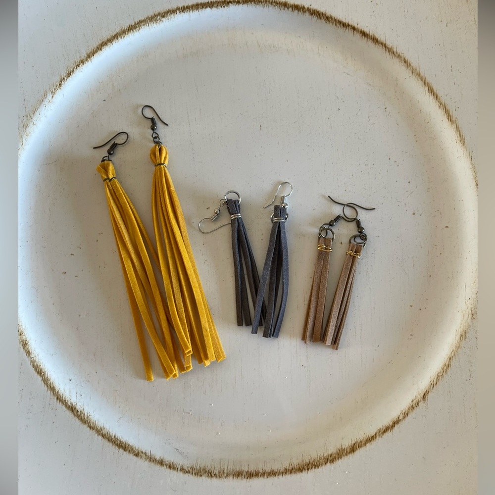 Bundle of three leather tassel earrings